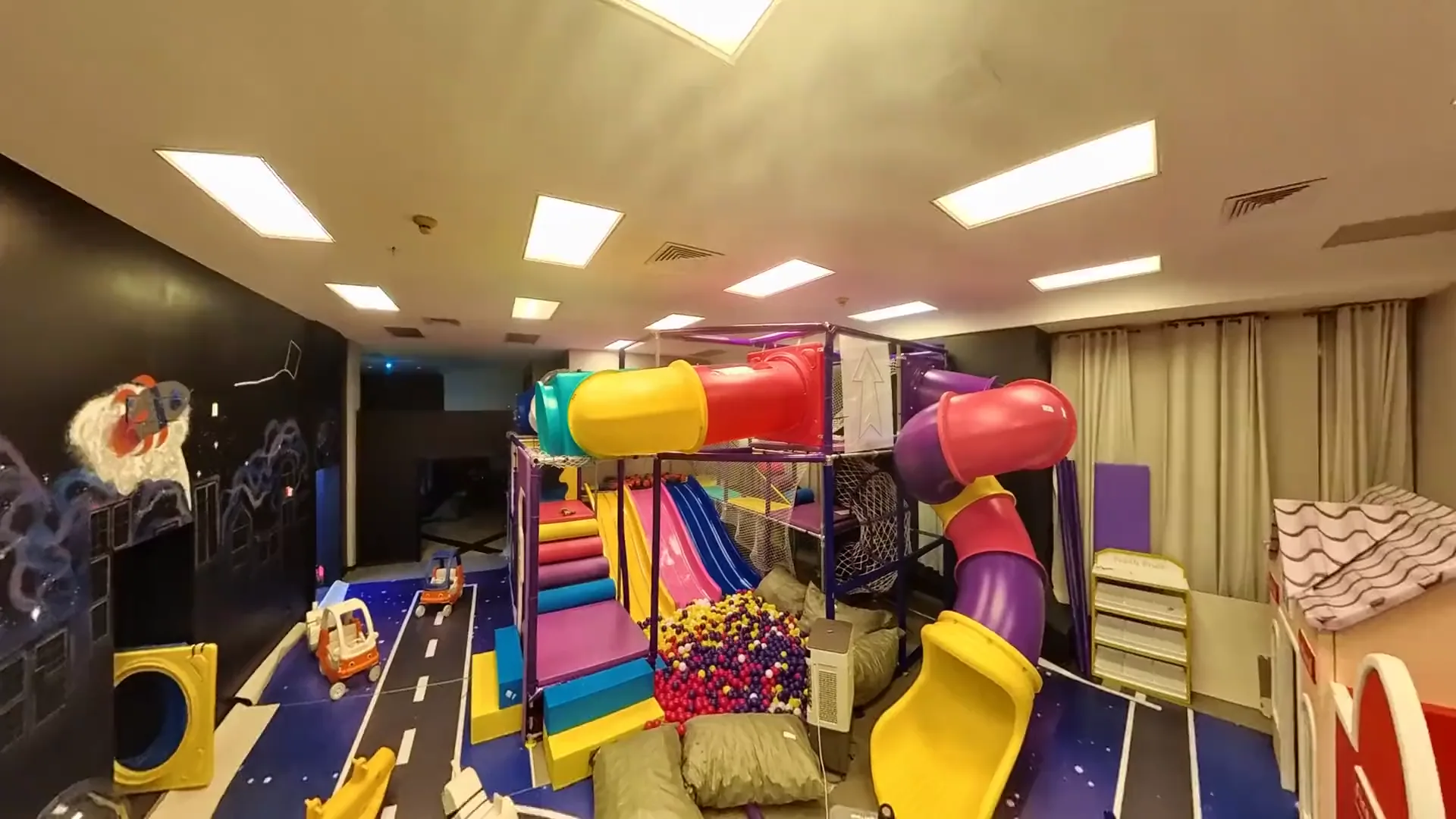 The jungle gym, ball pit, and the Villages play town inside The Family Hub Landing Zone